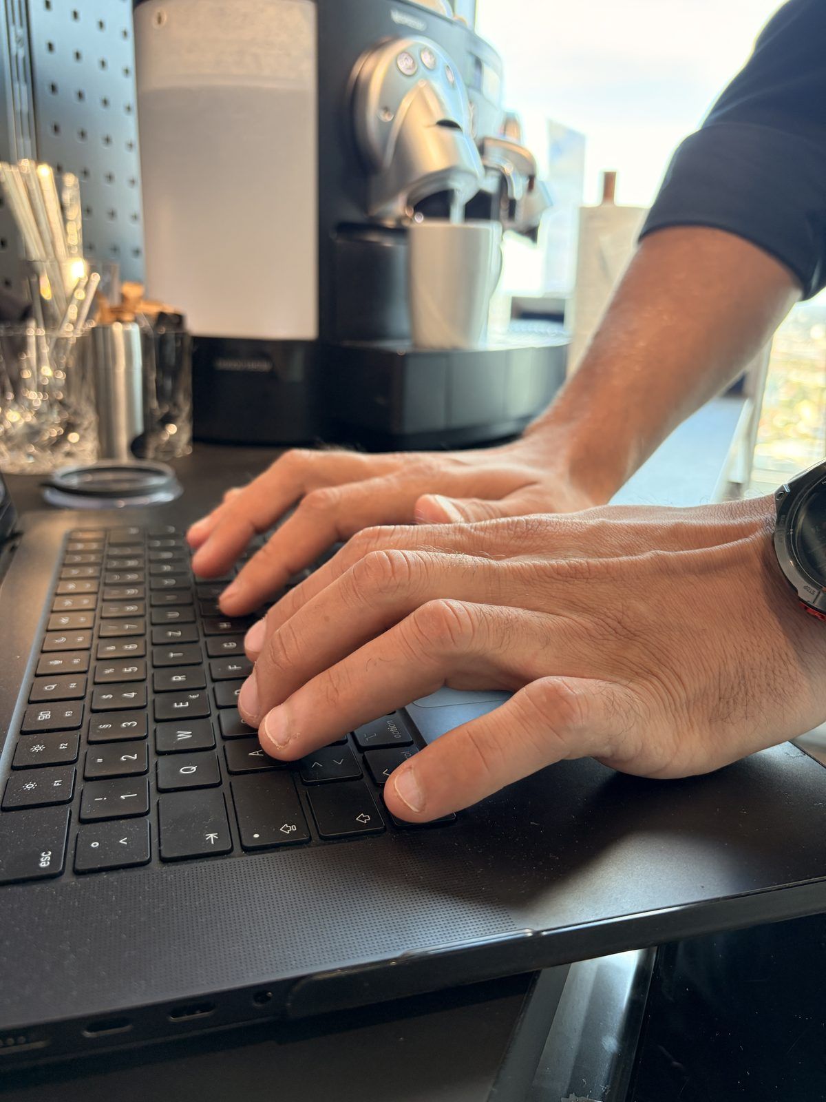 Hüseyin Torun setting up an AI automation at his computer